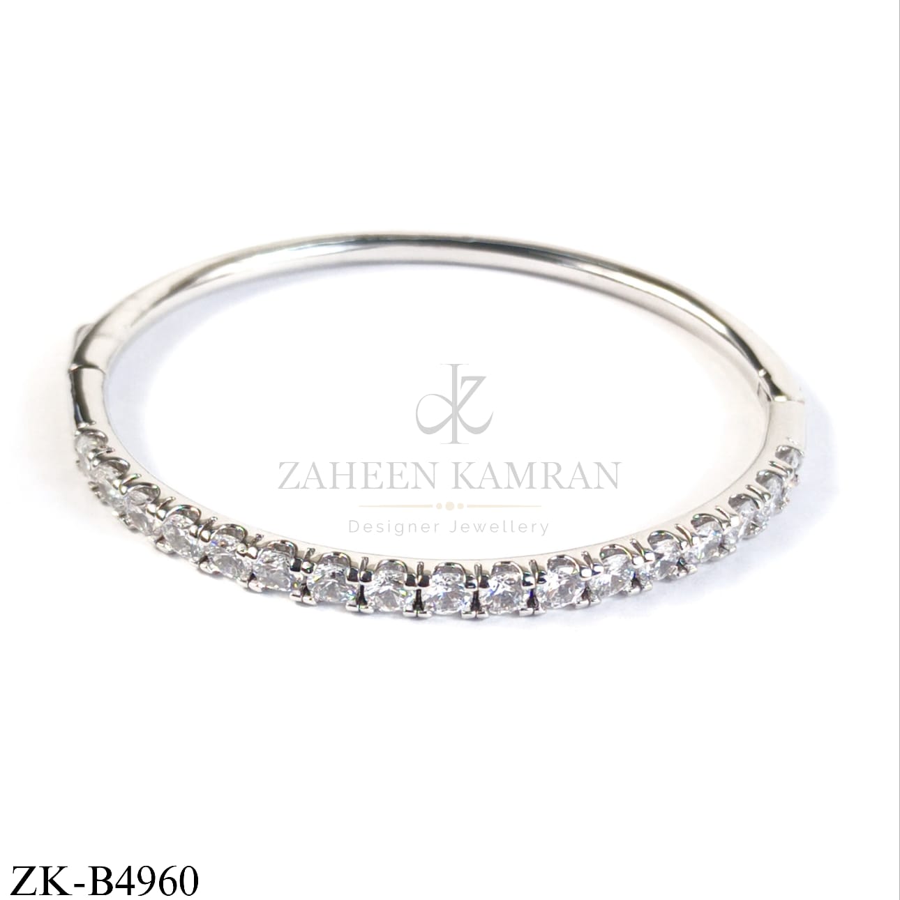 SILVER HALO ROUND ZIRCONIAN BANGLE