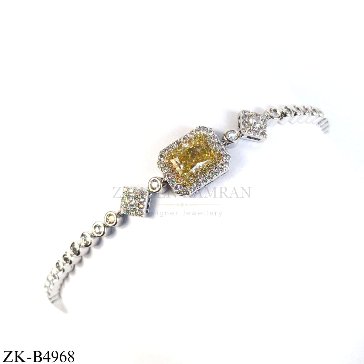 SILVER ZIRCONIAN BRACELET WITH YELLOW JADE CENTRE