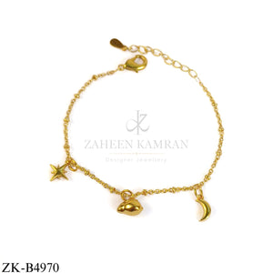 GOLD TONE BRACELET WITH STAR MOON DROP CHARMS