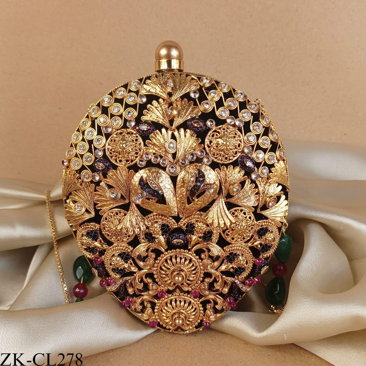 ROUND HERITAGE CLUTCH