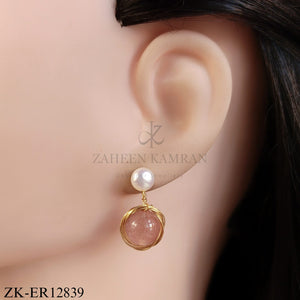 GOLD TONE EARRINGS WITH PEARL TOP AND SOFT PINK STONE
