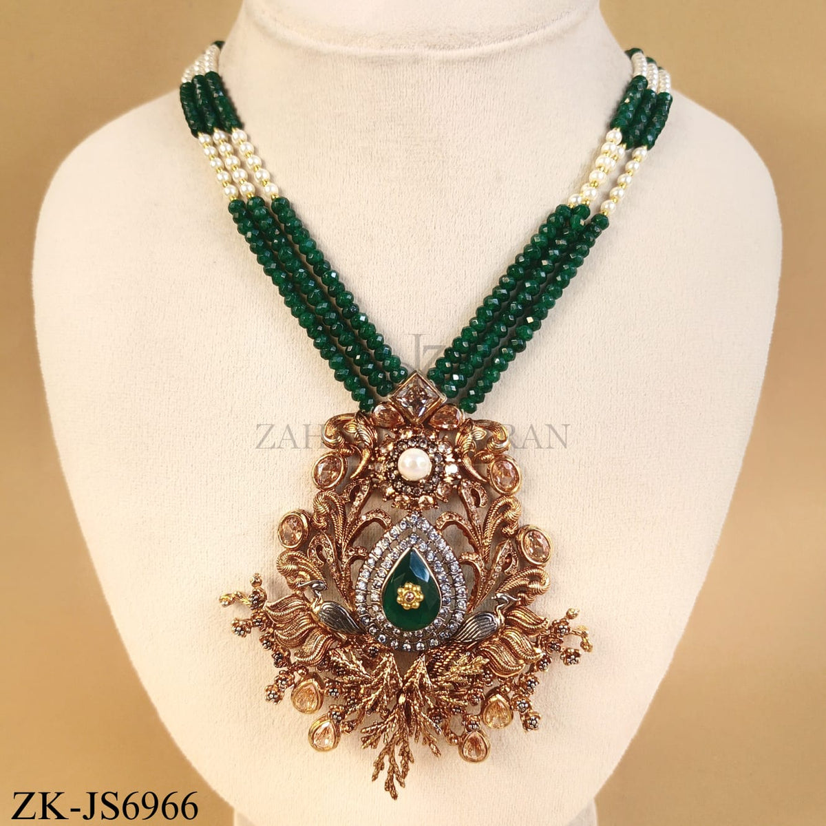 ANTIQUE EMERALD CENTRE CHAMPAGNE SET