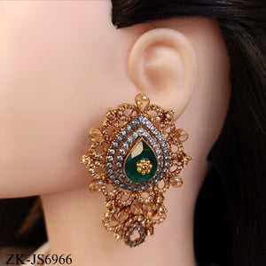 ANTIQUE EMERALD CENTRE CHAMPAGNE SET