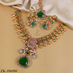LUXURY PINK ZIRCONIA SET WITH EMERALD CENTERPIECE