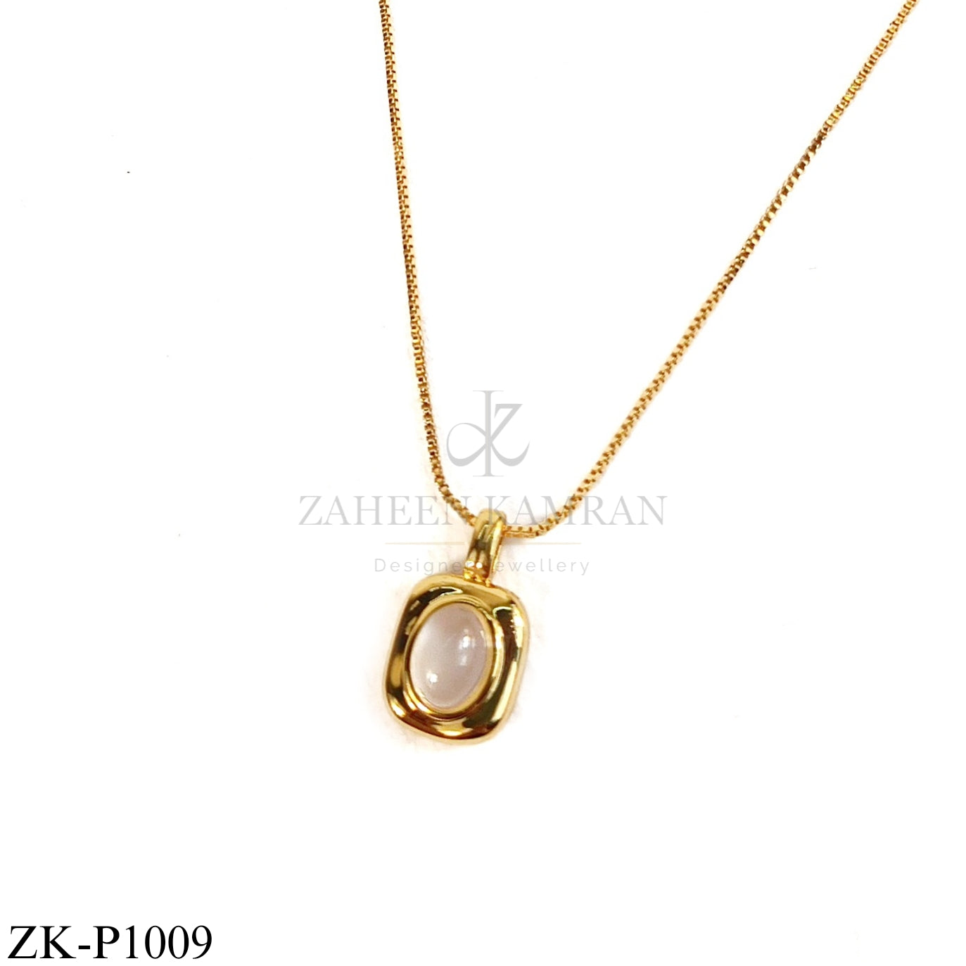 Gold-framed milky stone pendant - Zaheen Kamran