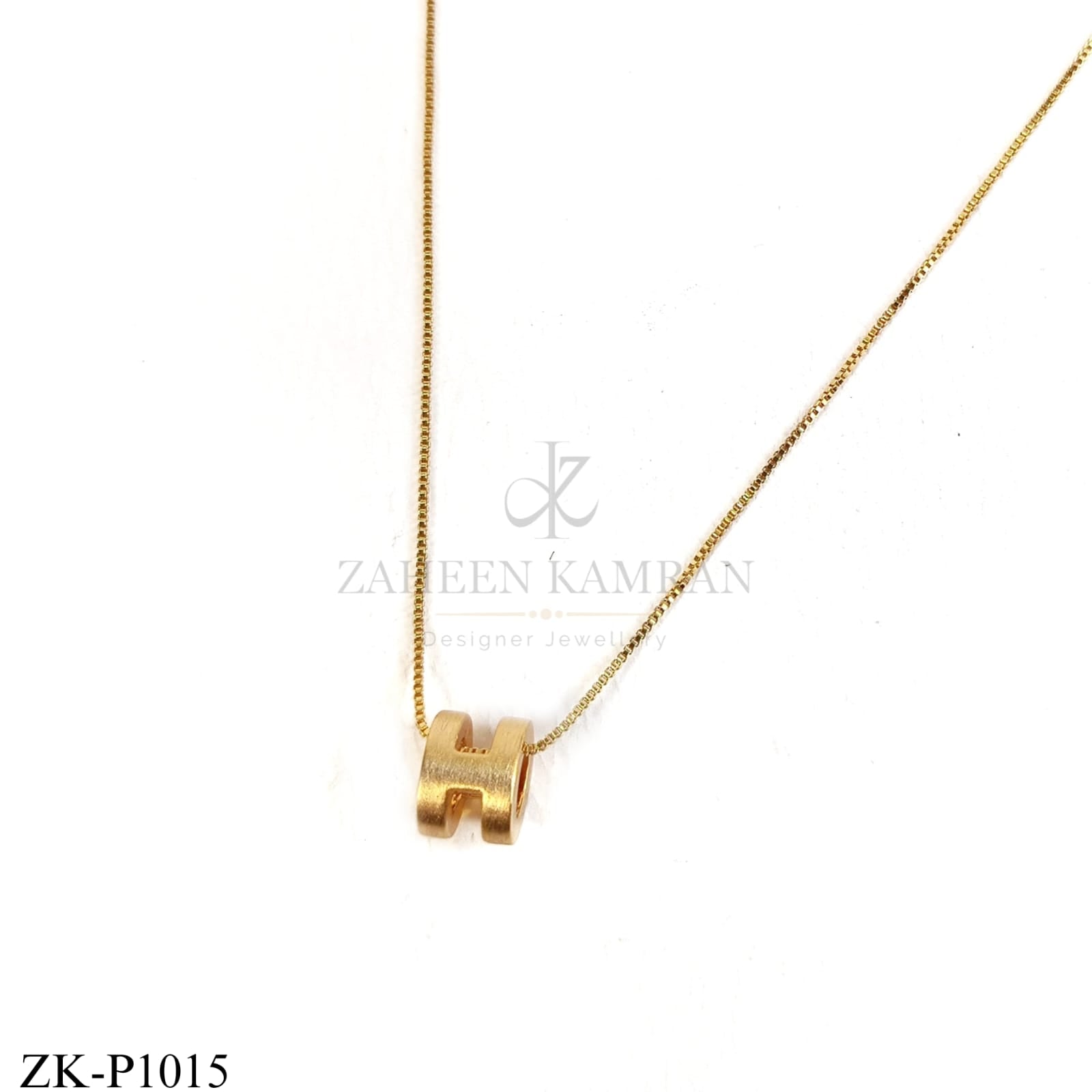 GOLD TONE H PENDANT