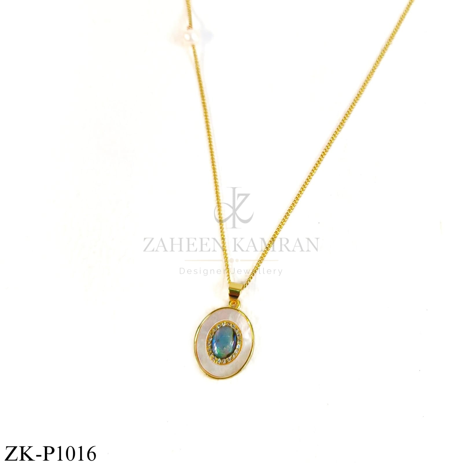 Gold oval pendant with blue-green centre stone - Zaheen Kamran