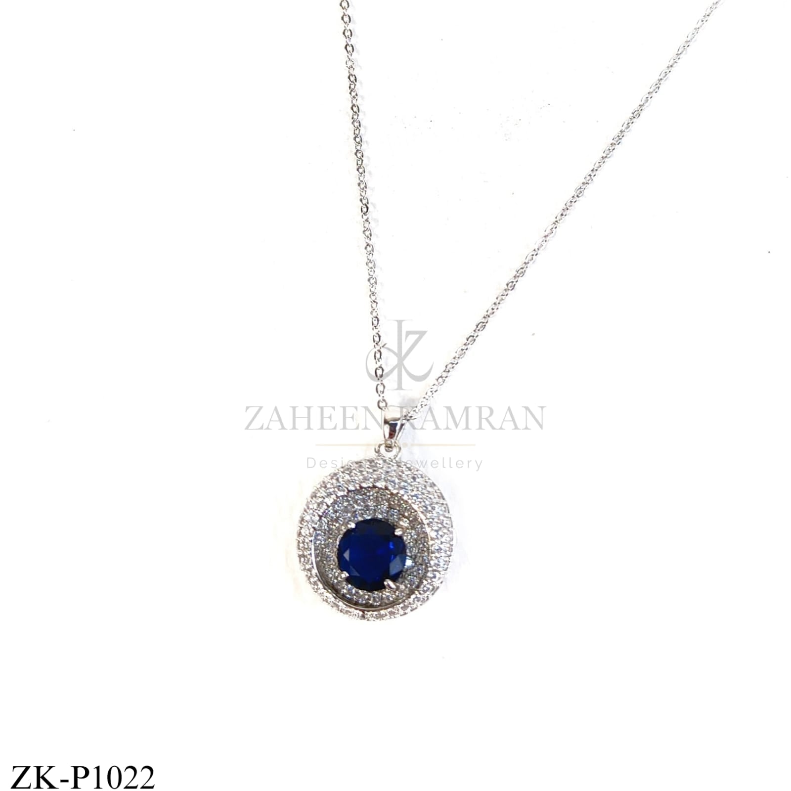 Silver round pendant with blue centre stone - Zaheen Kamran