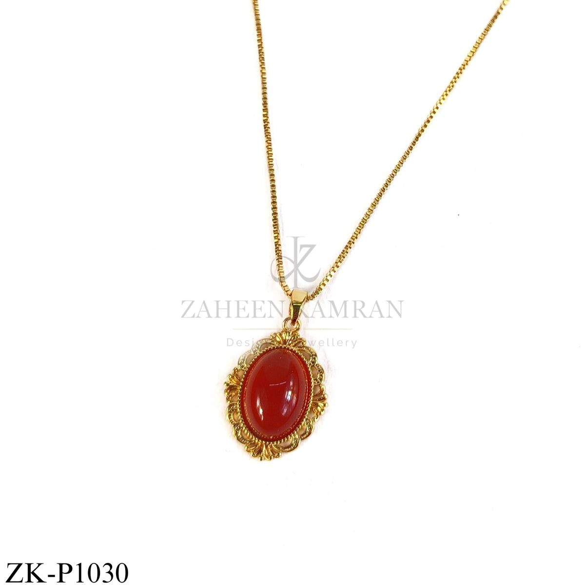 Vintage gold oval pendant with red stone - Zaheen Kamran