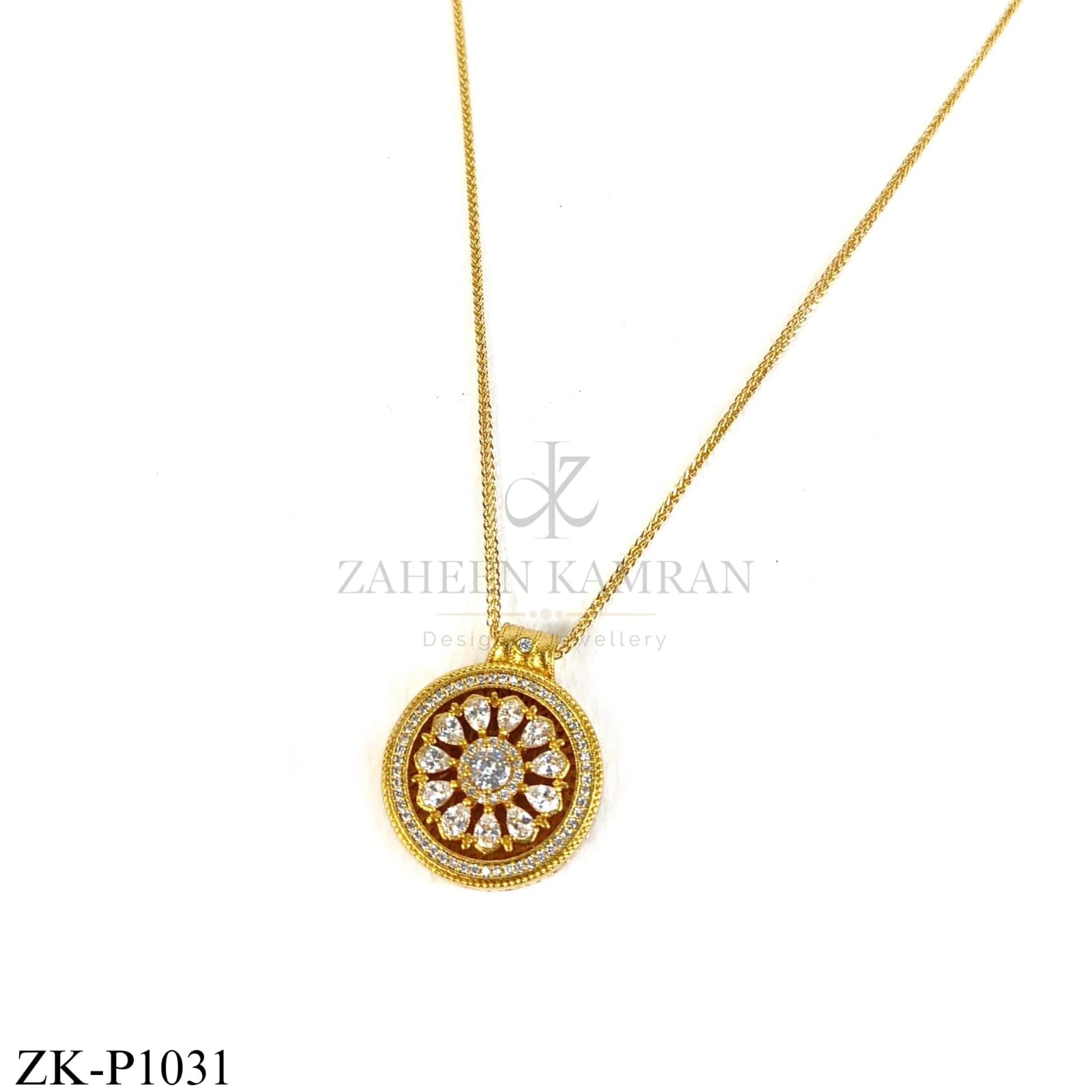 Round gold pendant with clear stone flower design - Zaheen Kamran