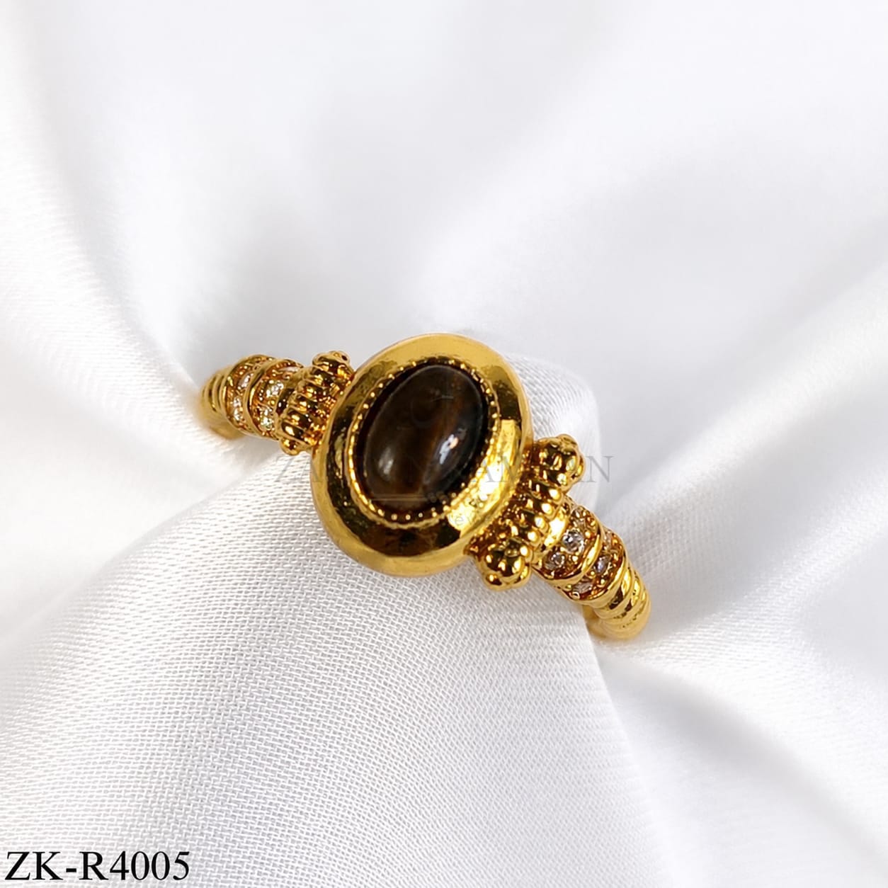 OVATE BROWN RING