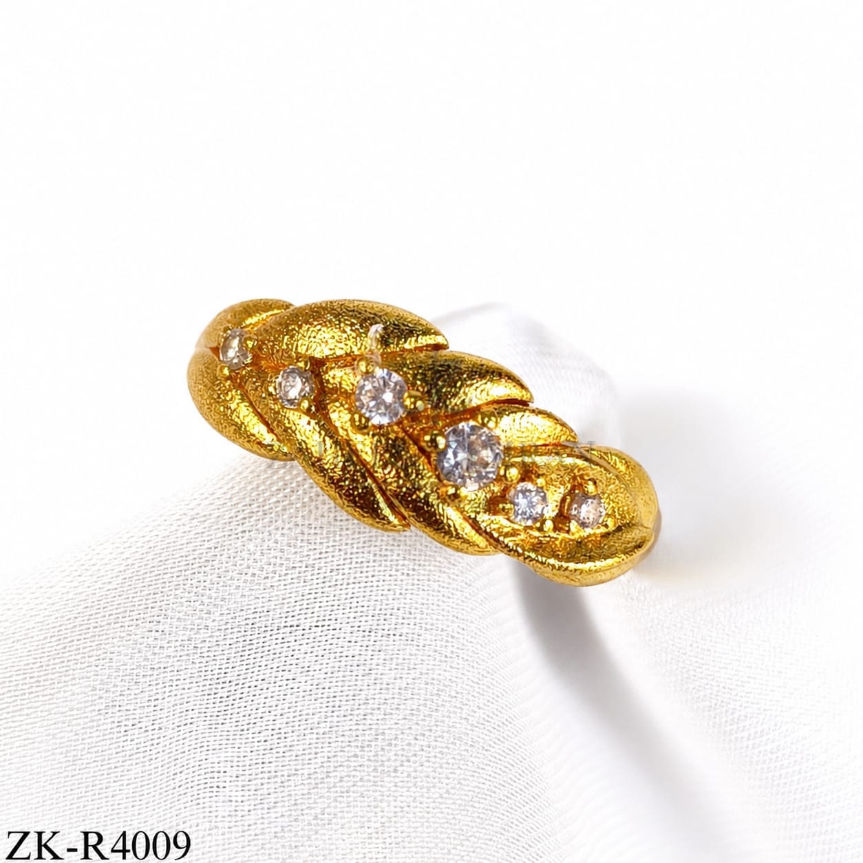 TWISTED ZIRCONS RING