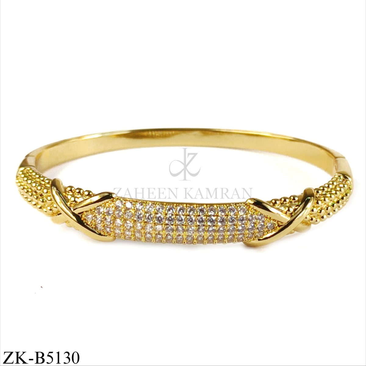 X SHAPED ZIRCONS BANGLE