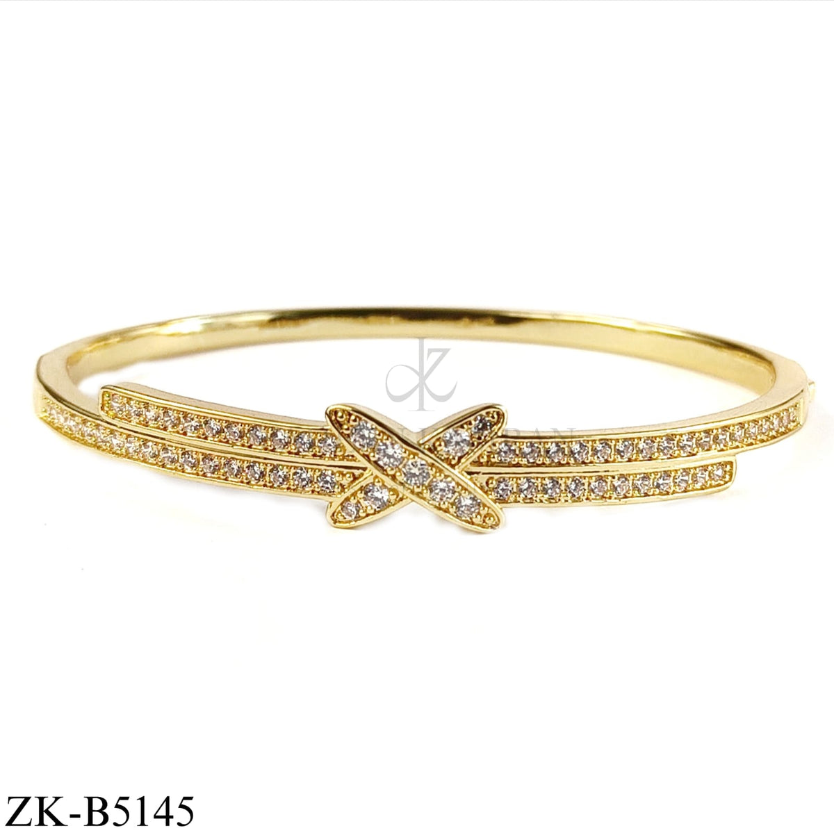 X ZIRCONIAN BANGLE