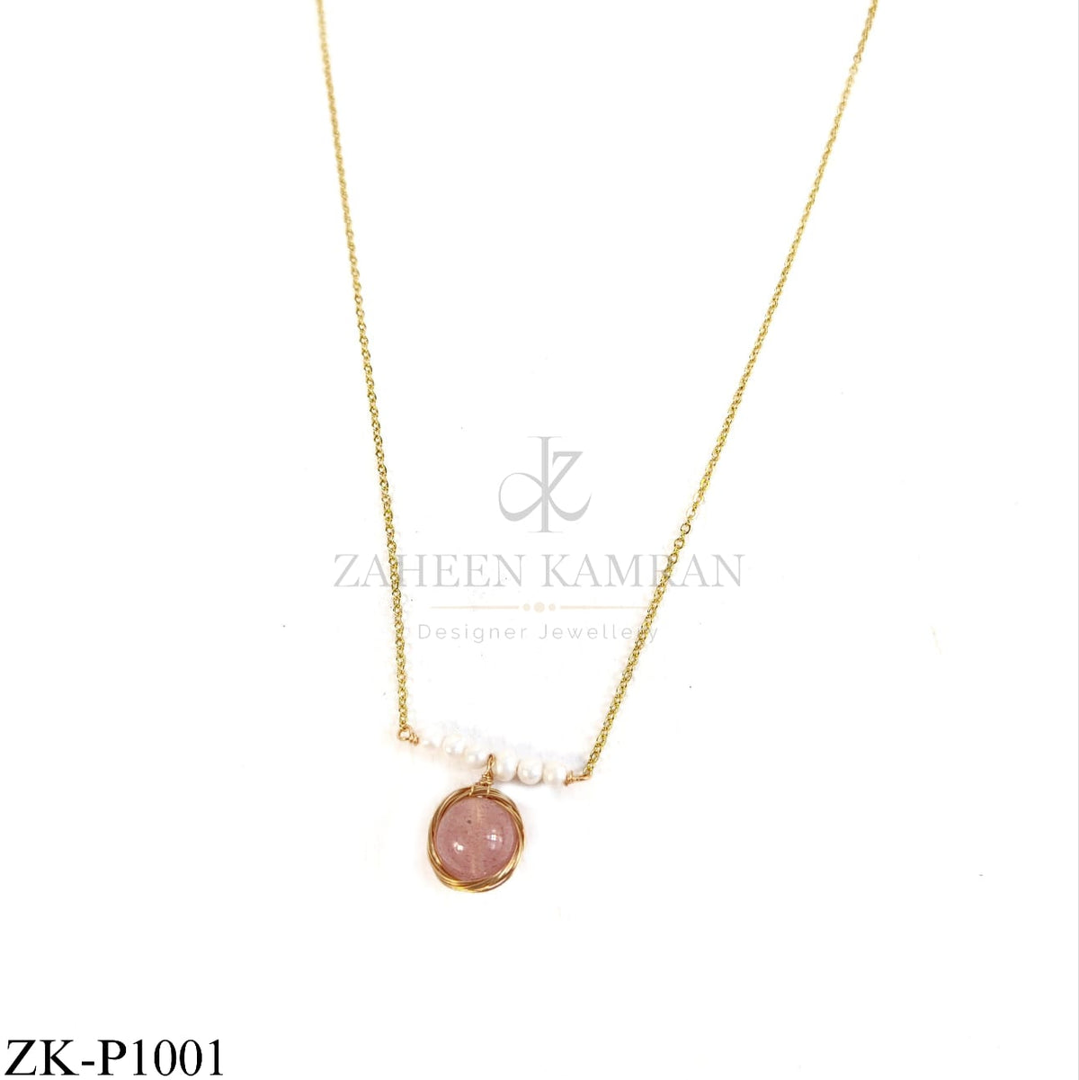 Gold wire-wrapped pearl pendant - Zaheen Kamran Zamaré Collection