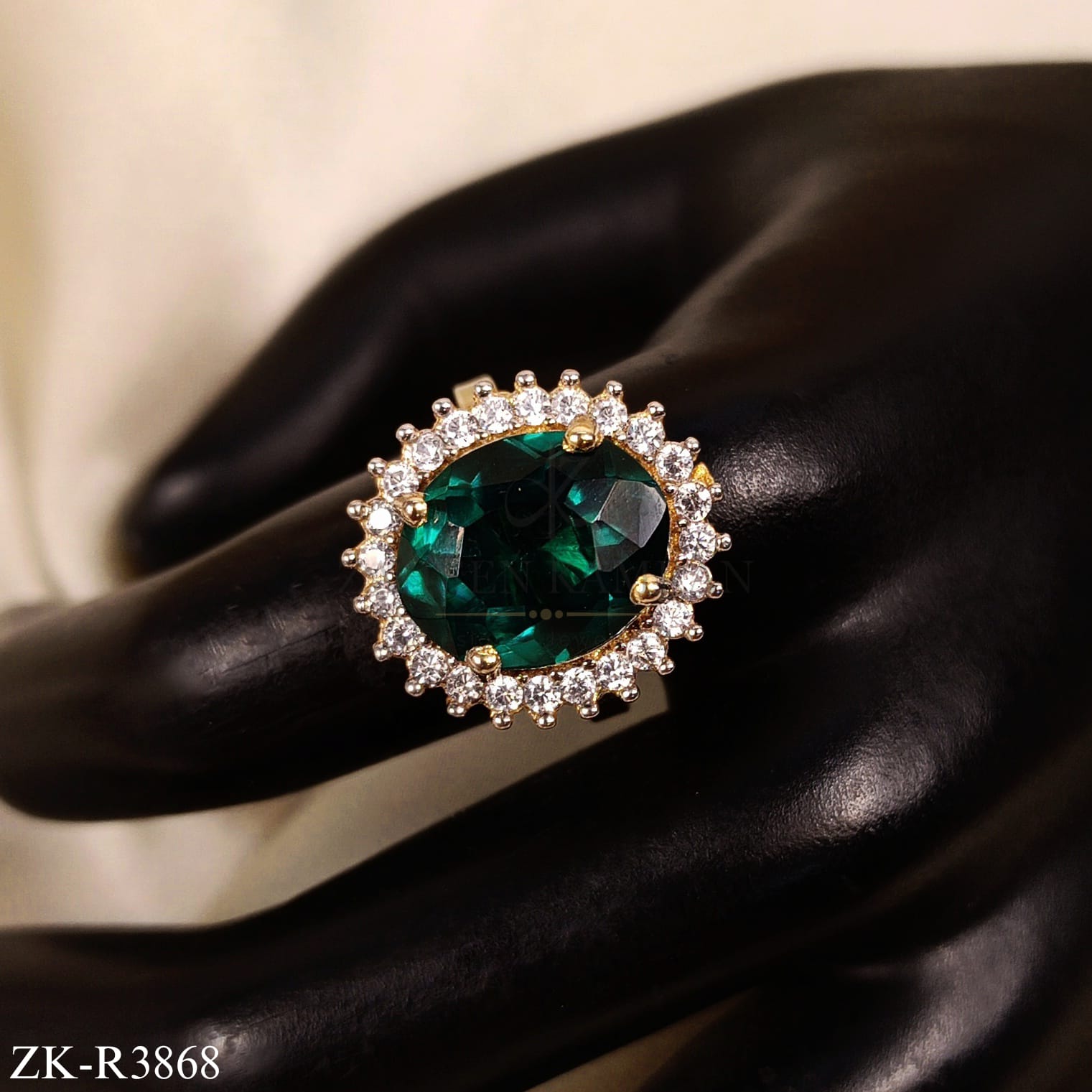 OVATE EMERALD RING WITH ZIRCONIA