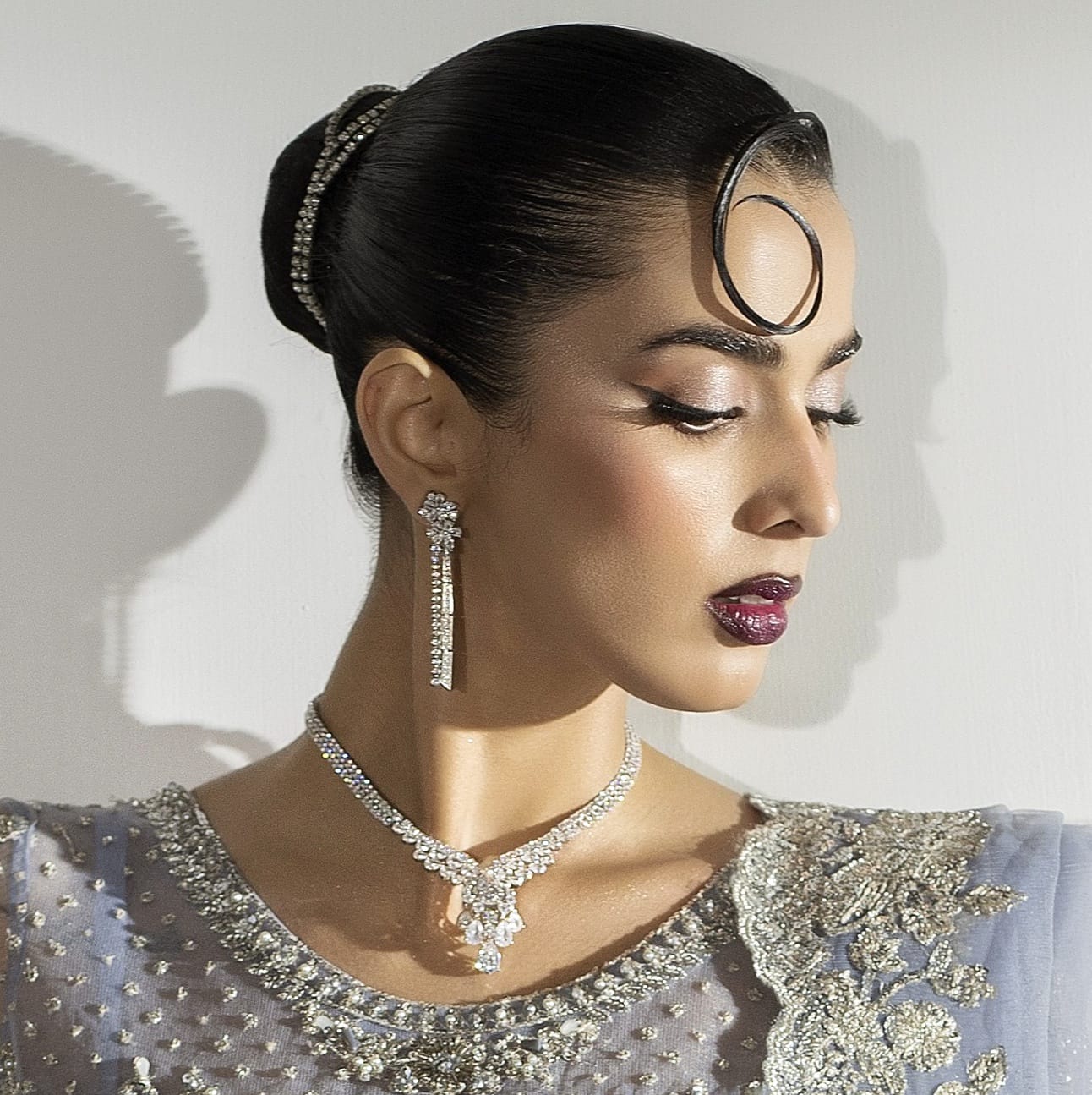 A Refined Pairing of Necklace Earrings