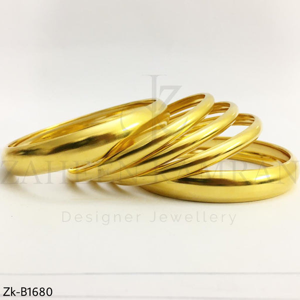 Bright gold bangles