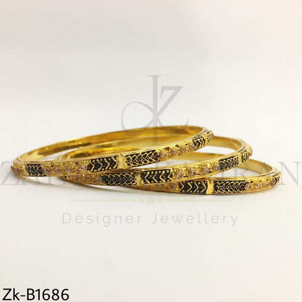 Sleek champagne bangles