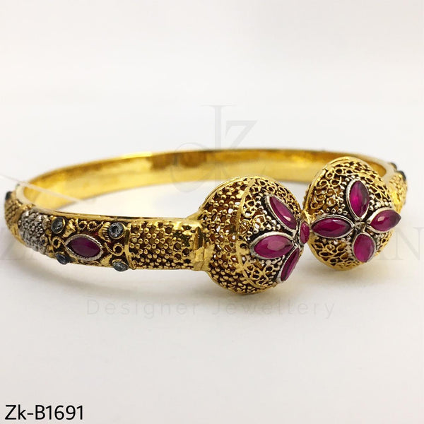 Ruby gold bangle