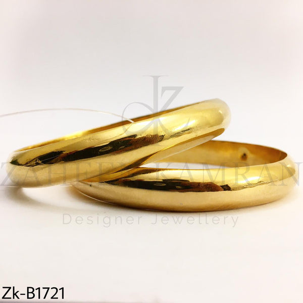 Shiny broad bangles