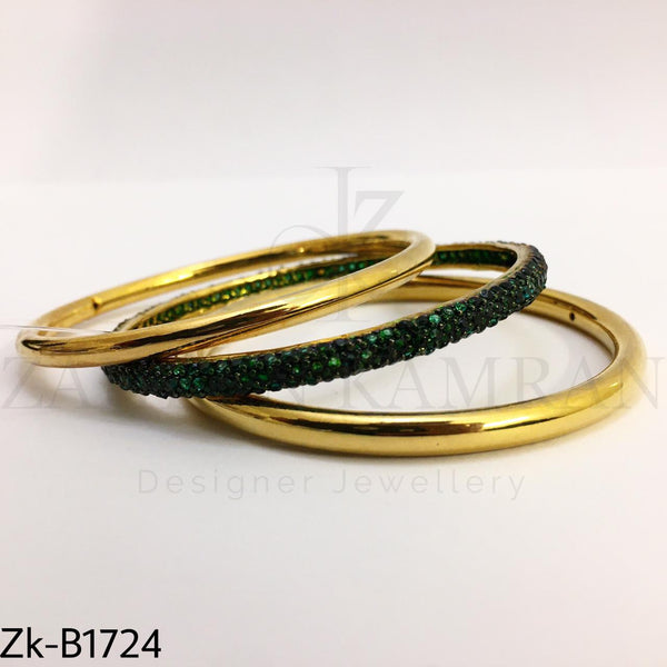 Golden emerald bangles