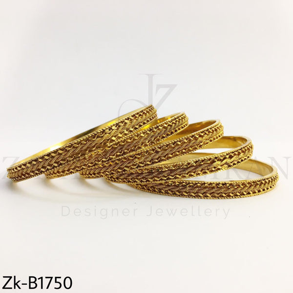 Swril golden bangles