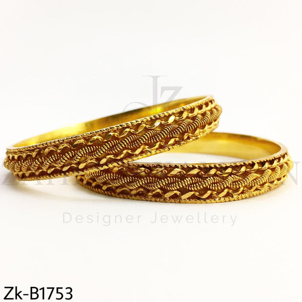 Swril golden bangles