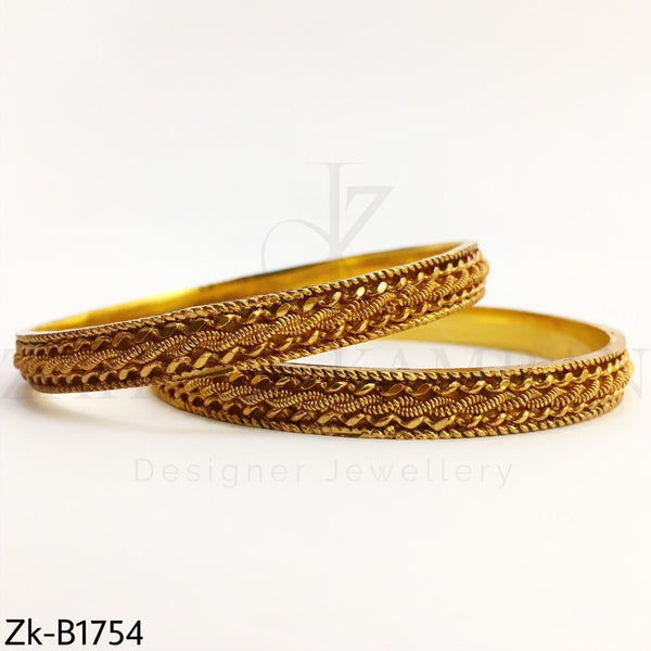 Swril golden bangles