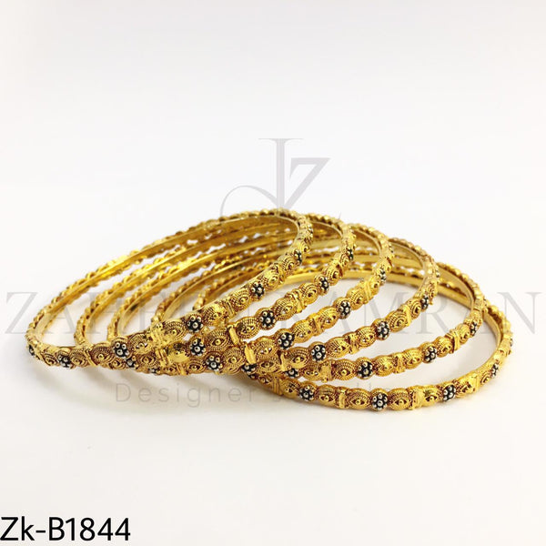 Sleek golden bangles