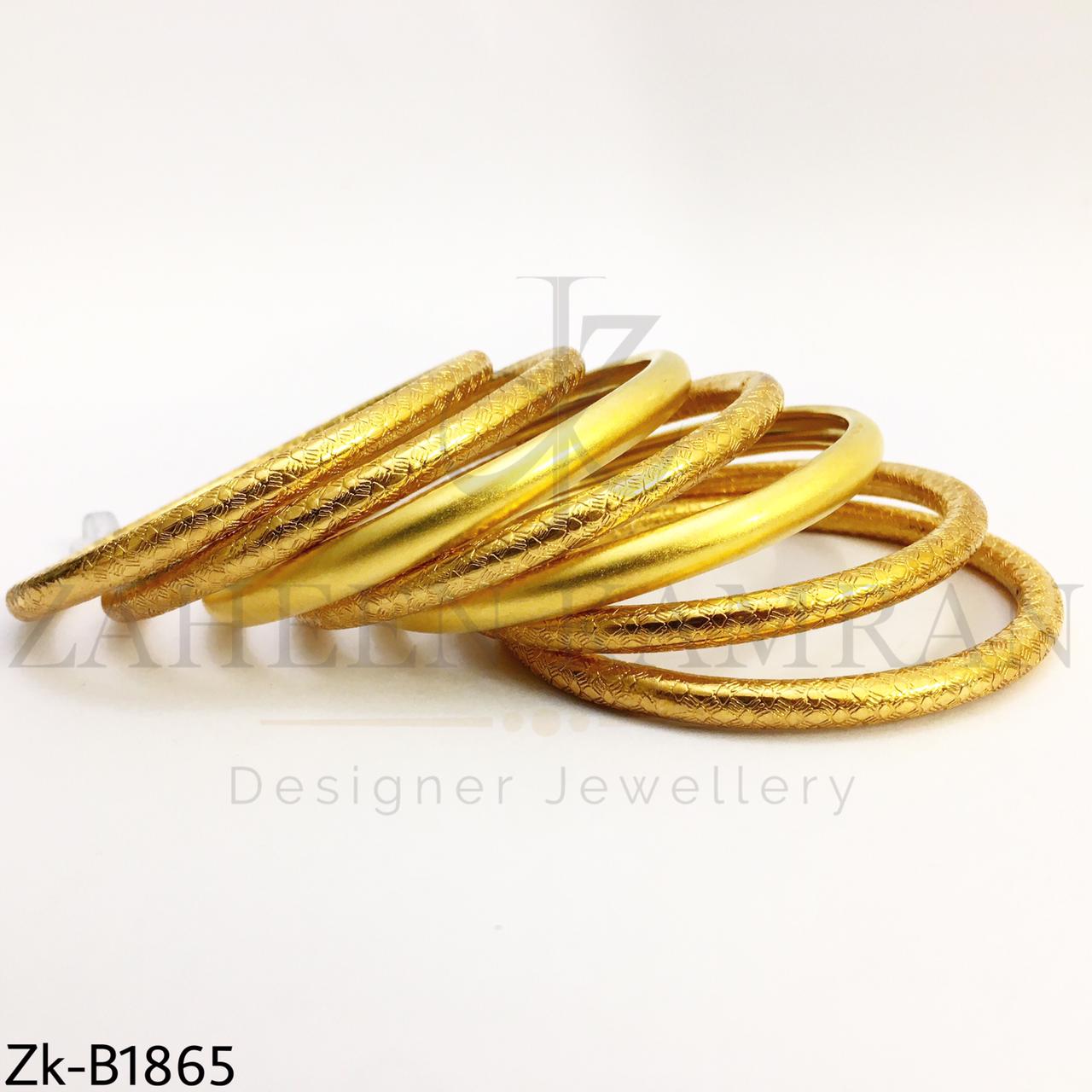 Textured golden bangles