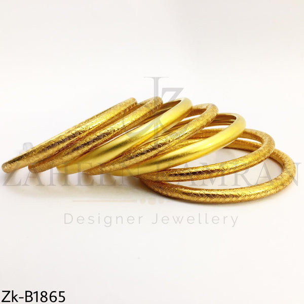 Textured golden bangles