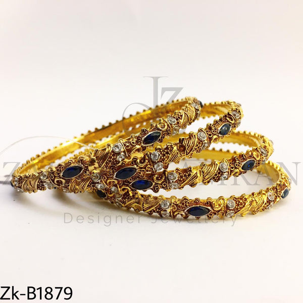 Detailed sapphire bangles