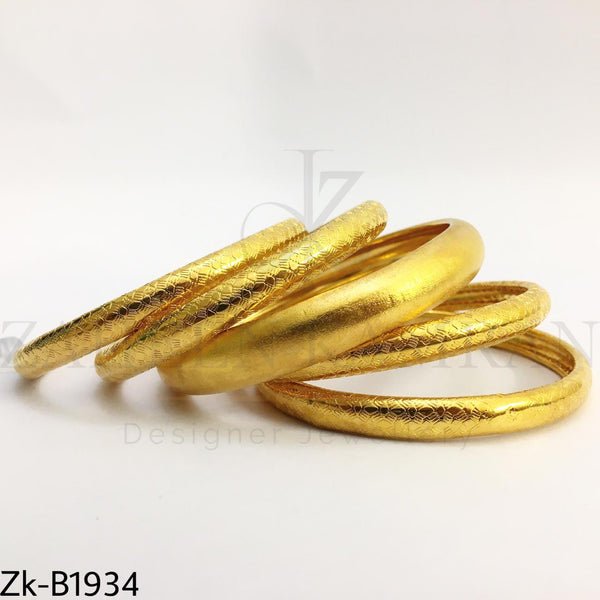 Golden textured bangles