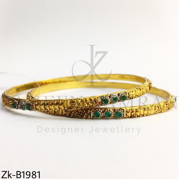 Sleek emerald bangles