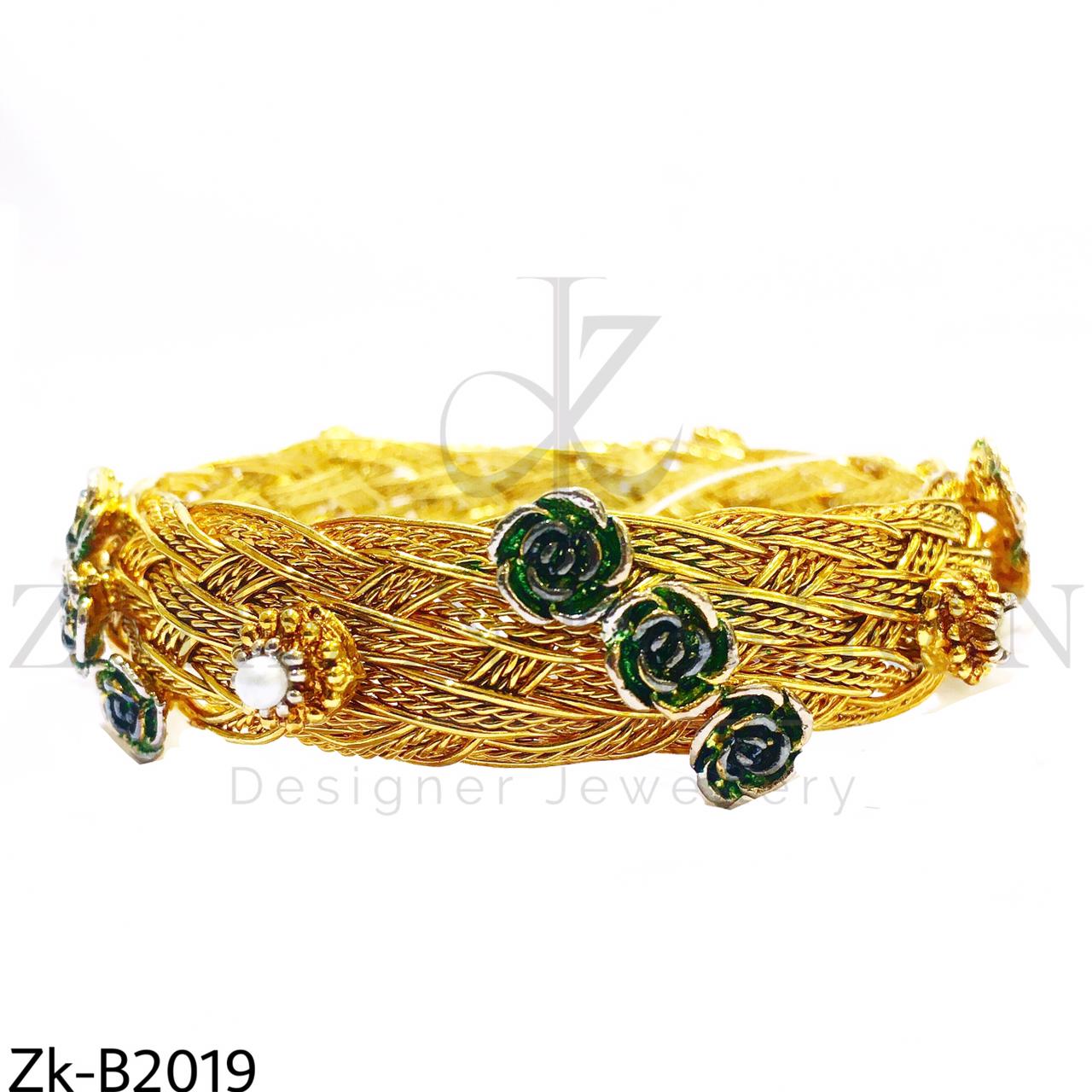 Broad braided bangle