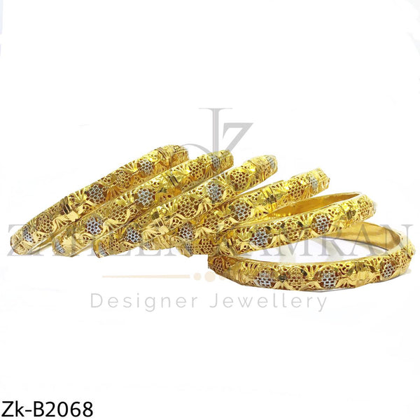 Golden detailed bangles