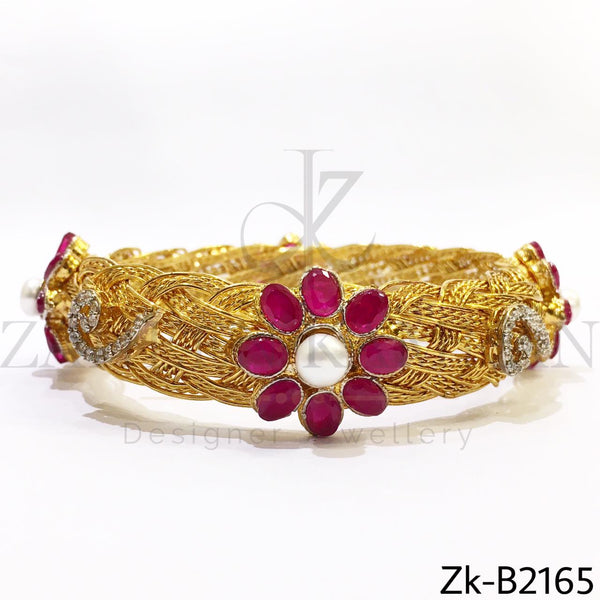 Braided ruby bangle