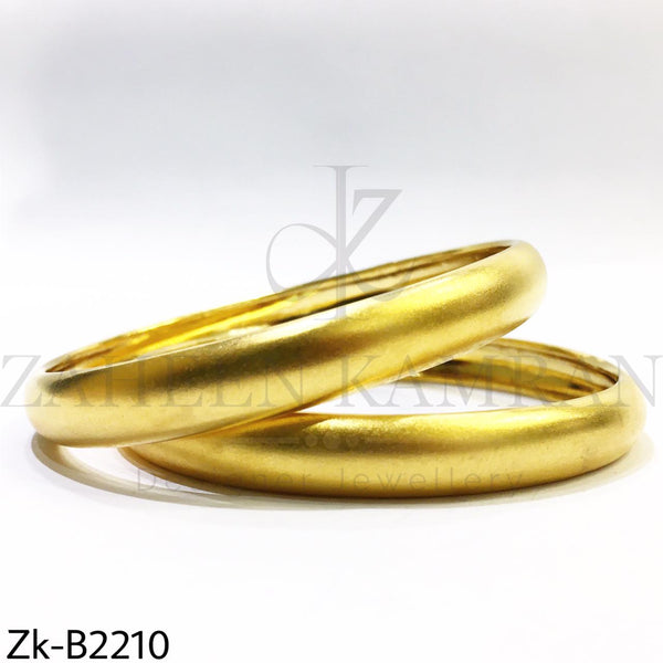 Broad shiny bangles