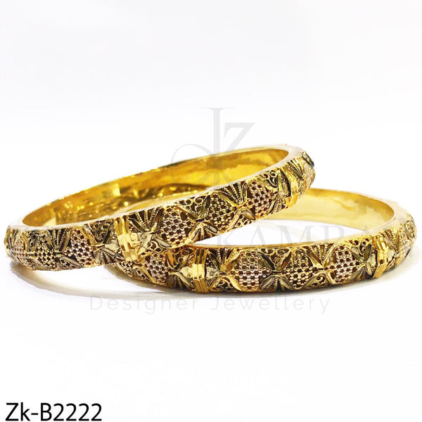 Golden detailed bangles