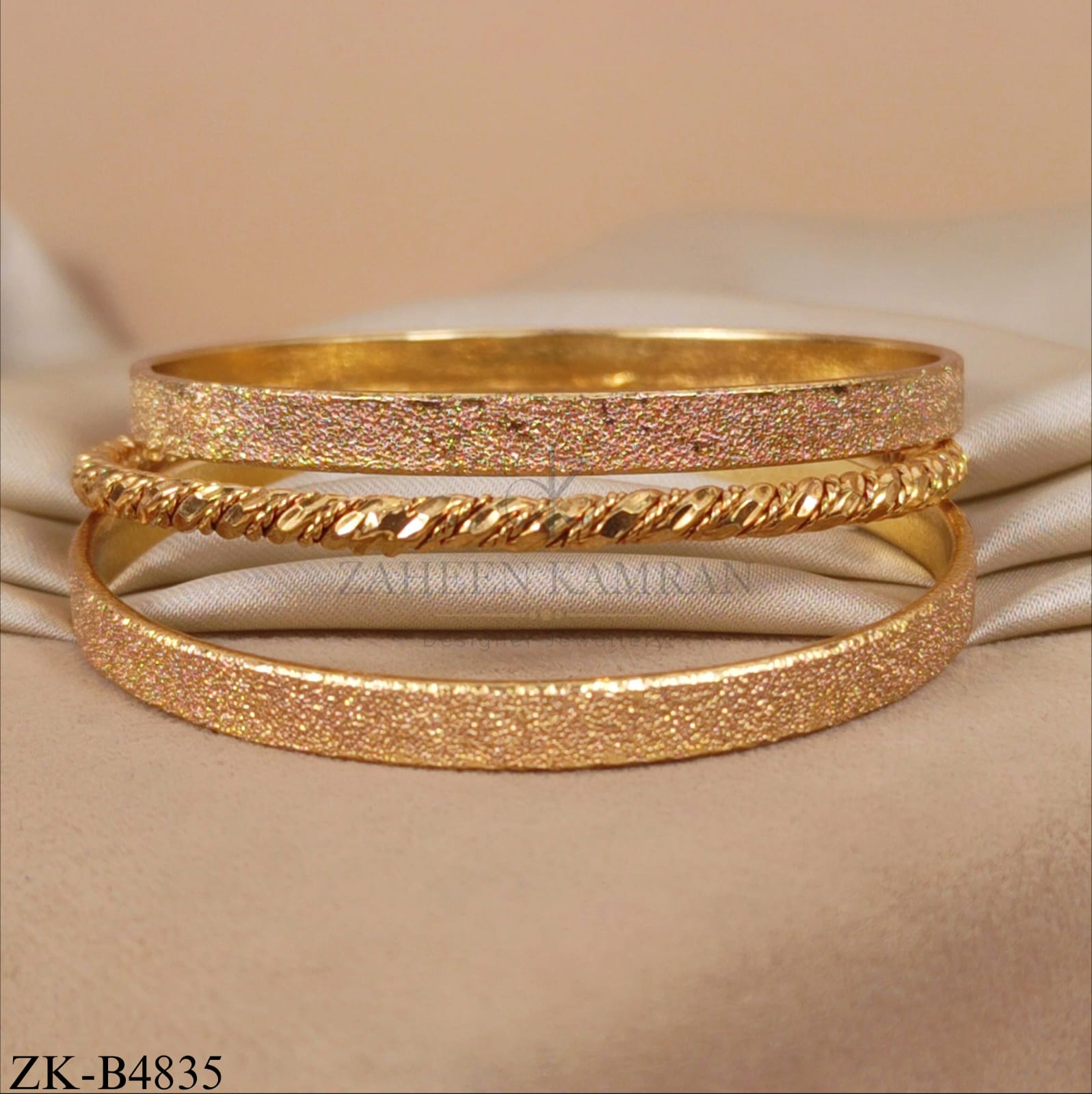 TWISTED BANGLES