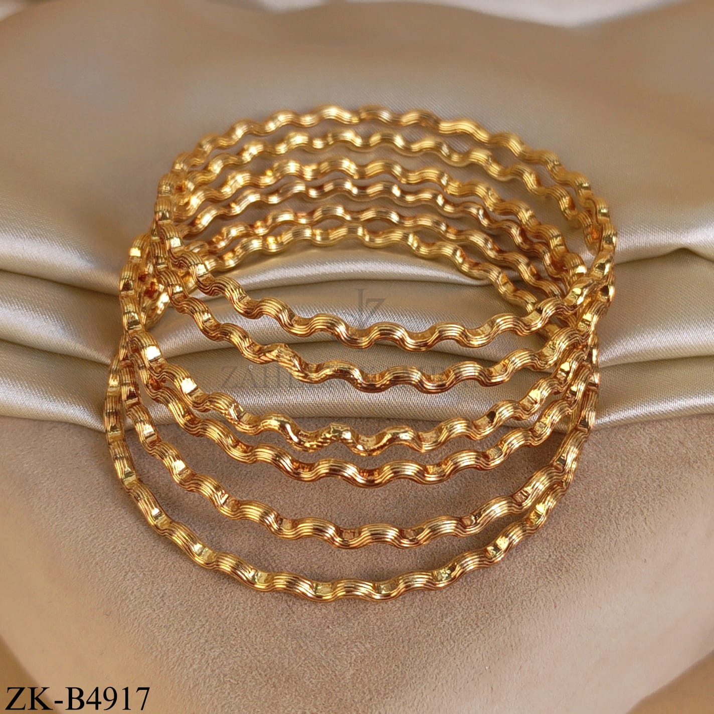 GOLD TONE SLIM WAVY BANGLES