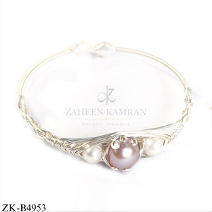 SILVER WIRE COIL CENTRE SOFT PINK AROUND PEARLS BANGLE