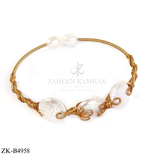 GOLD WIRE CUFF WITH FIVE WHITE OPALS AND WRAP DETAIL