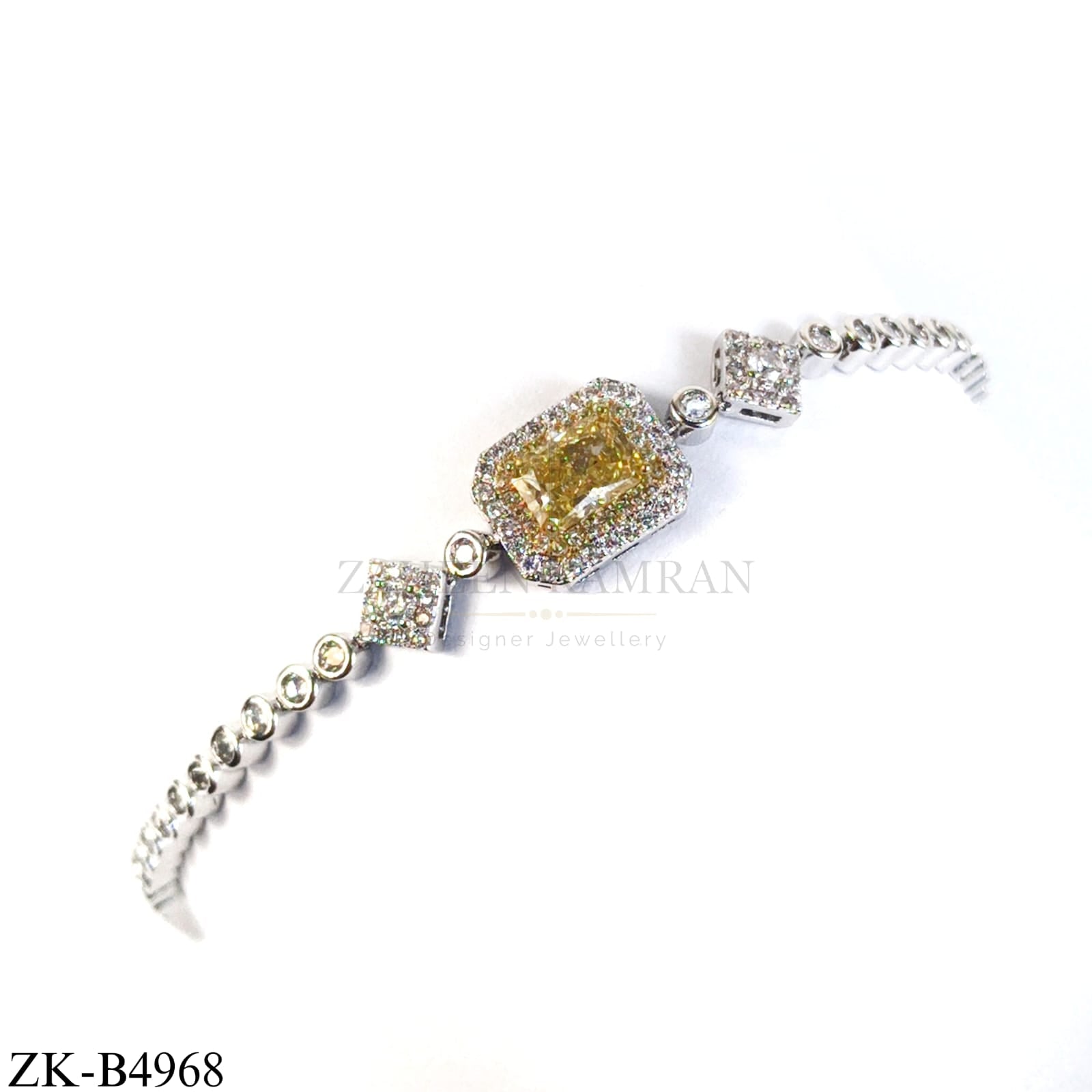 SILVER ZIRCONIAN BRACELET WITH YELLOW JADE CENTRE