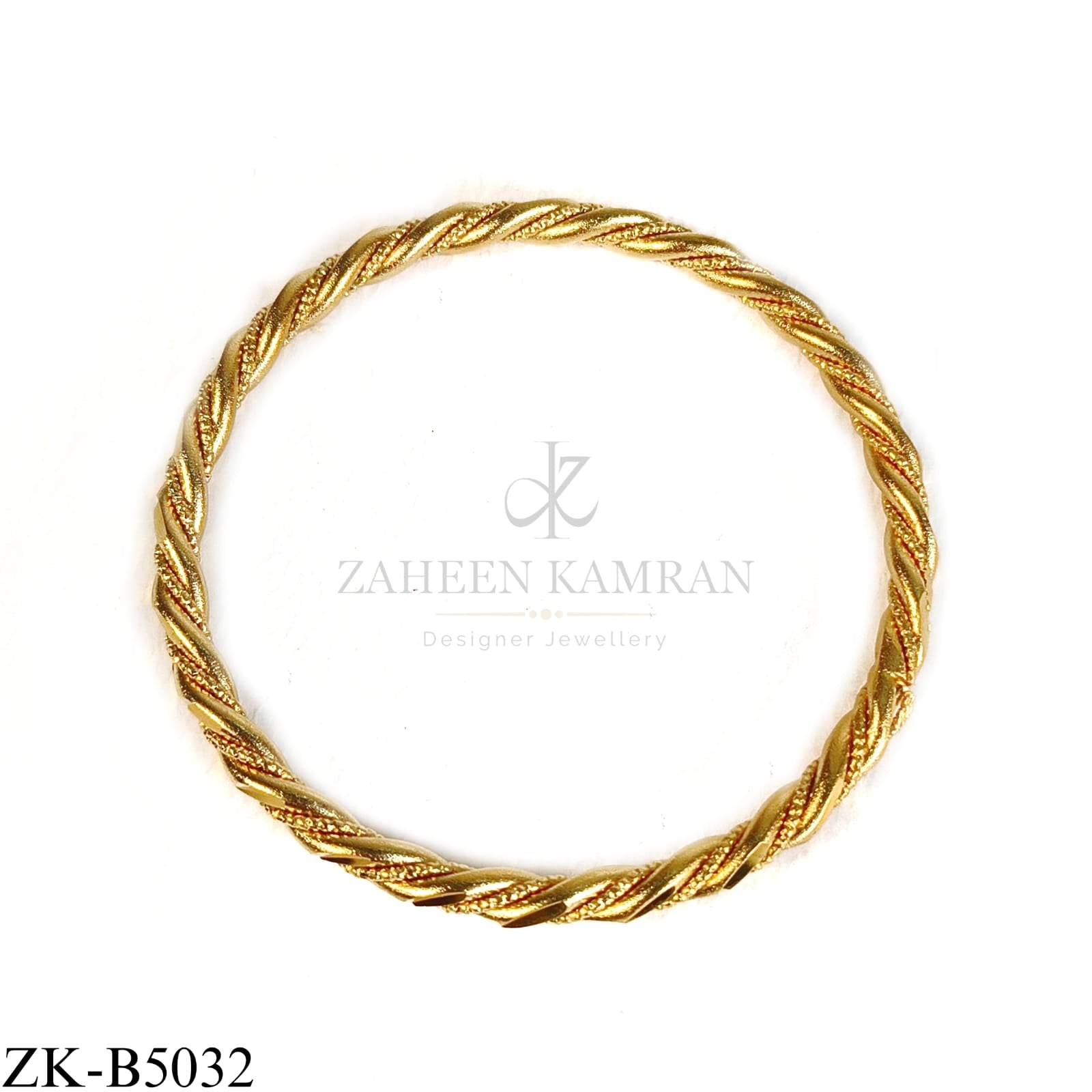 GOLDEN TWISTED BANGLE