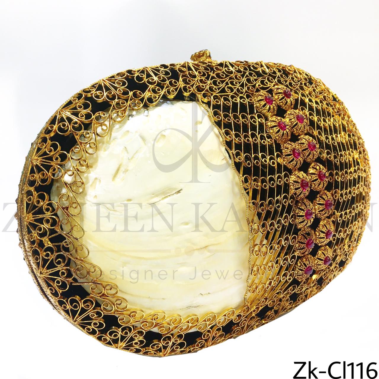 Signature gold oval clutch