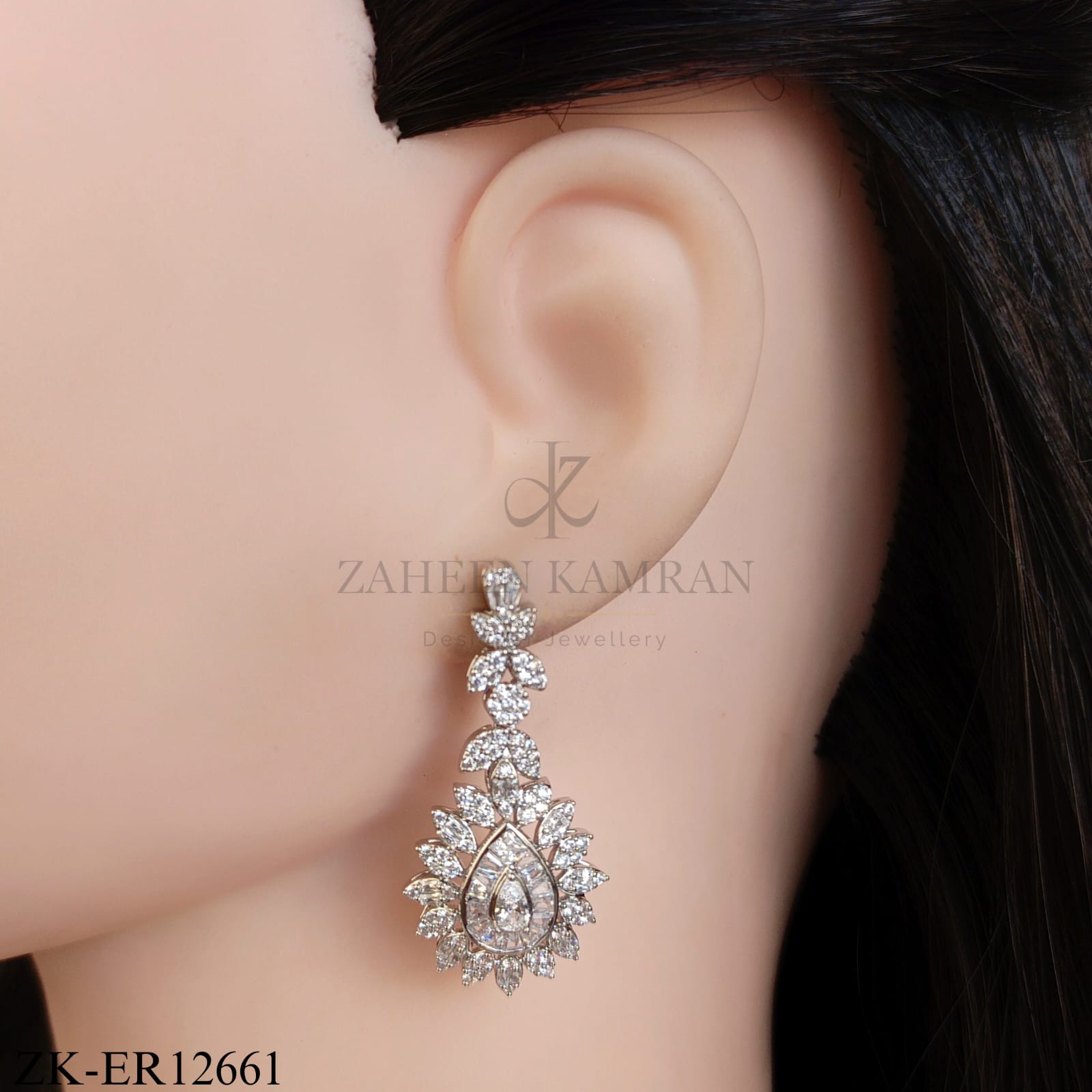 SILVER TONE PEAR SHAPED EARRINGS