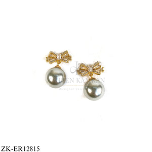 GOLD BOW GREY PEARL DROP EARRINGS