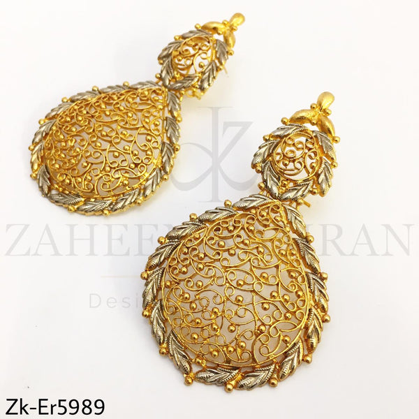 Golden detailed earrings